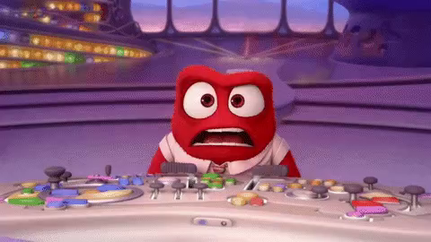 Angry (Inside out) bursting into flames at a control console